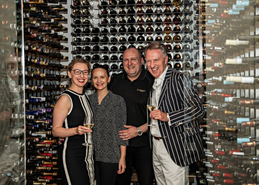 Paulius with his wife Vida (center) alongside restaurant guests, Guildhawk company founder Jurga Žilinskiene MBE, and David Clarke. Photo: Gyles Photoart.